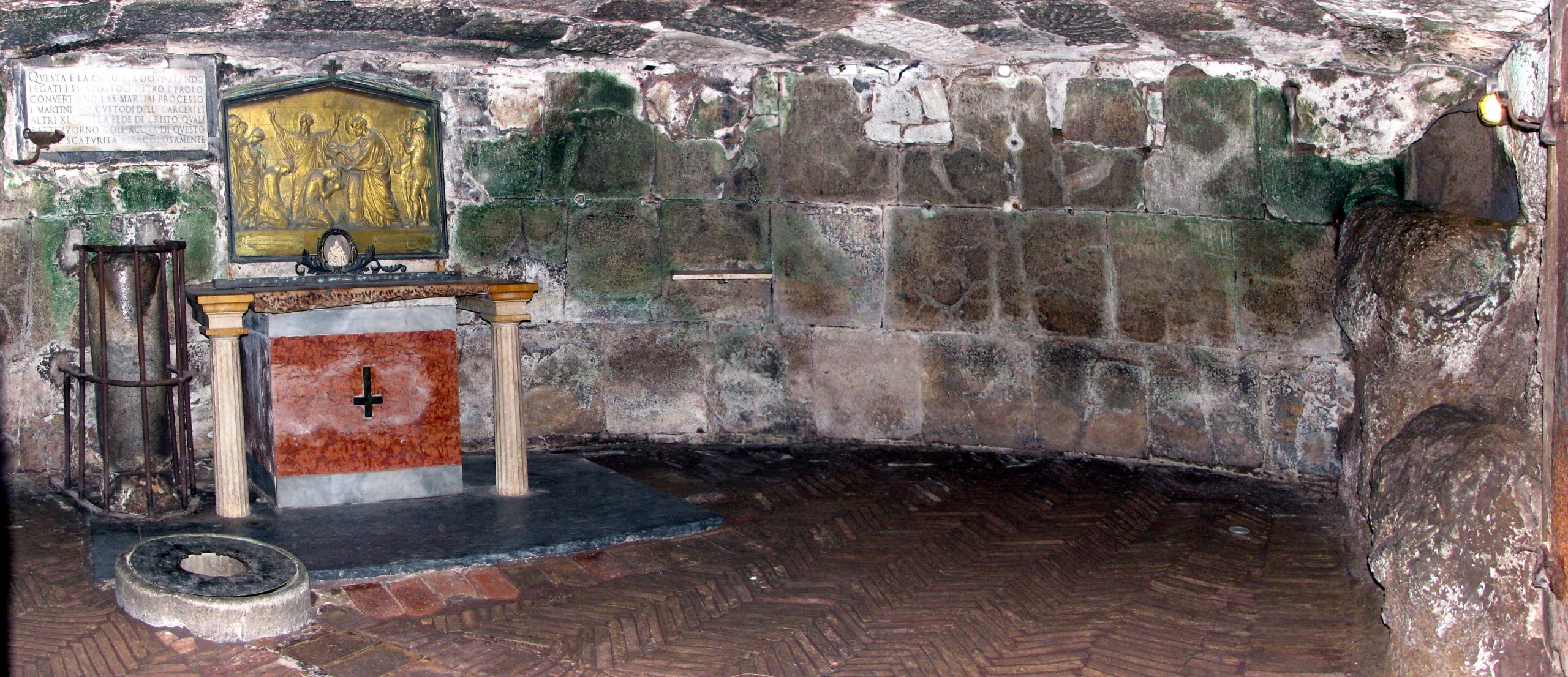 Interior of the Mamertine Prison in Rome, with an altar and ancient stone walls